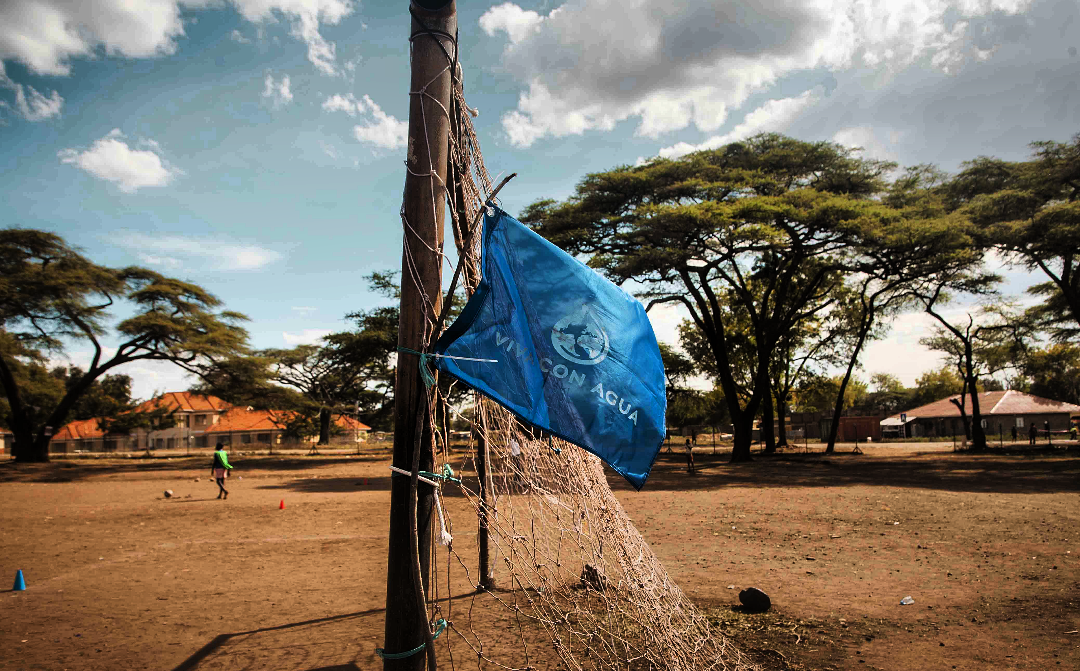 The Viva Con Agua Flag hoisted on a goal post